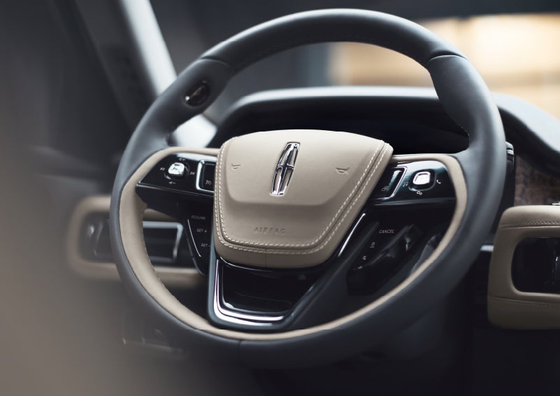 The intuitively placed controls of the steering wheel on a 2024 Lincoln Aviator® SUV | Buss Lincoln in McHenry IL
