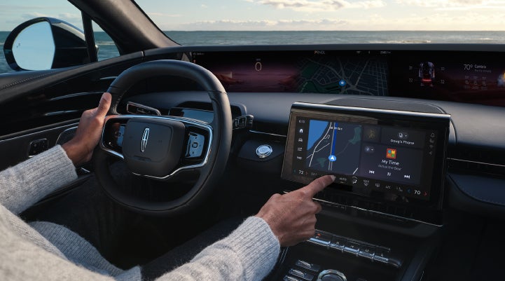 The driver of a 2024 Lincoln Nautilus® SUV interacts with the new Lincoln Digital Experience. | Buss Lincoln in McHenry IL