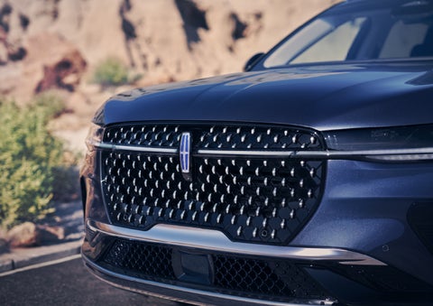 The stylish grille of a 2024 Lincoln Nautilus® SUV sparkles in the sunlight. | Buss Lincoln in McHenry IL
